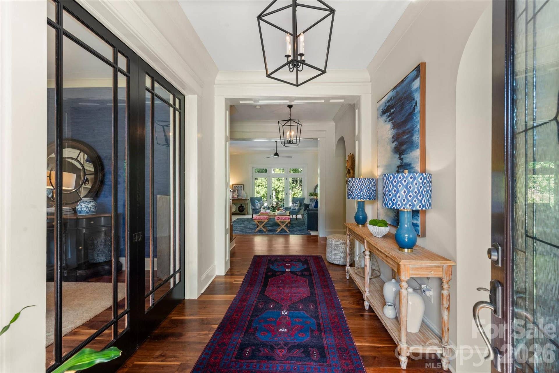 Welcome guests into an atmosphere of refinement, featuring sweeping arched, sun-lit entry...