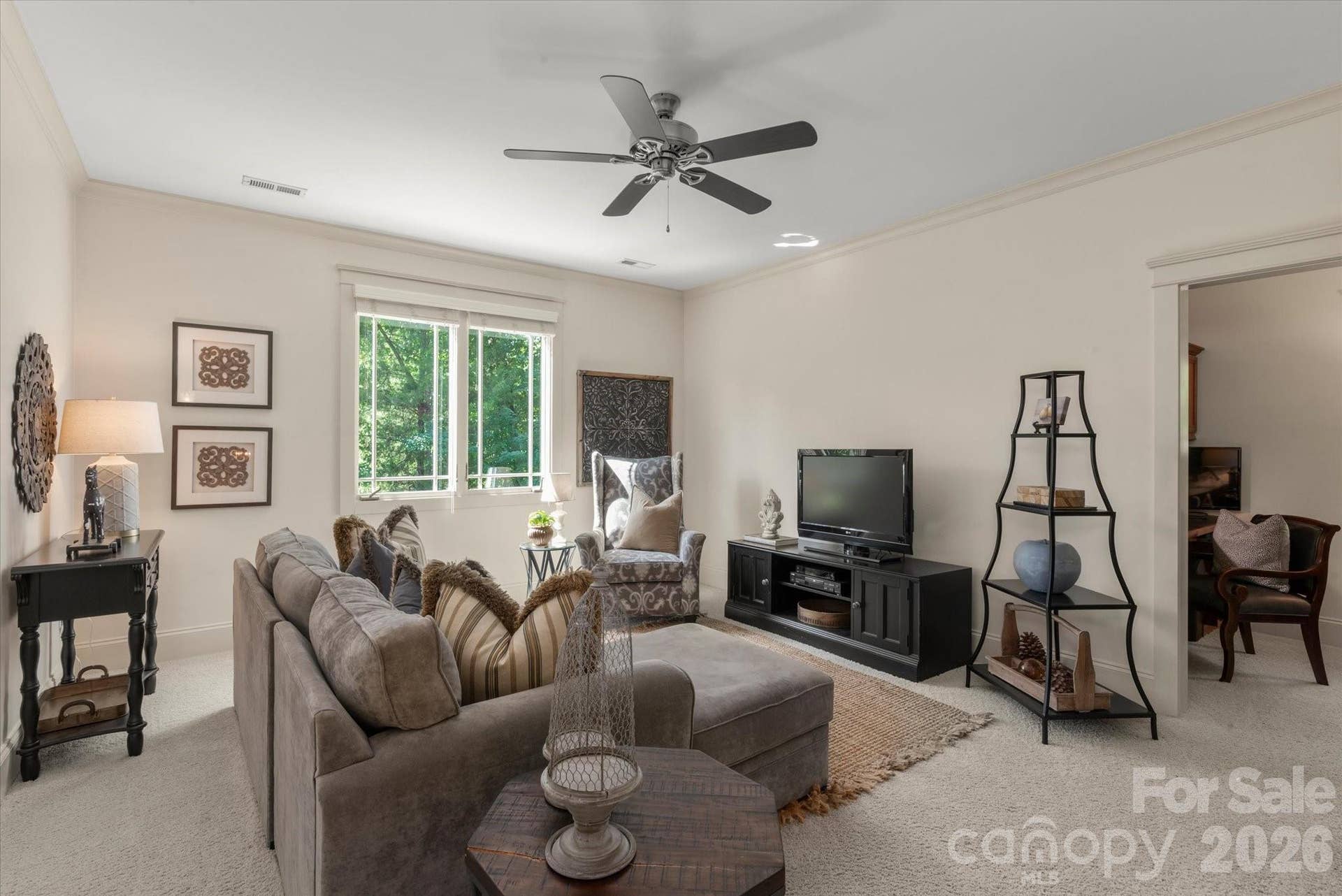 A versatile secondary living space perfect for a media room, home gym, or lounge area. Or can also function as the 5th bedroom.