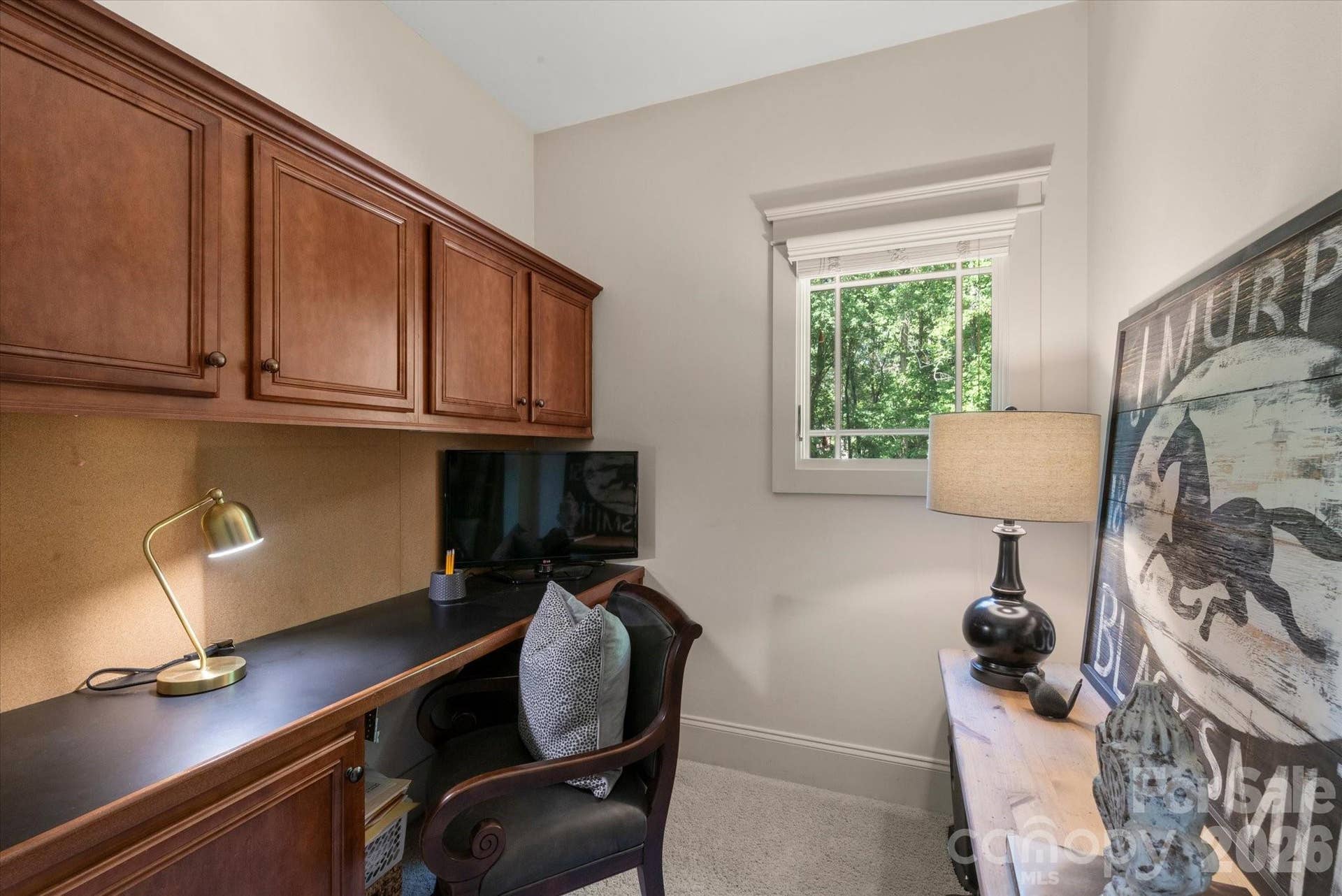 Secondary office is tucked off the Bonus room for privacy and an efficient work space.