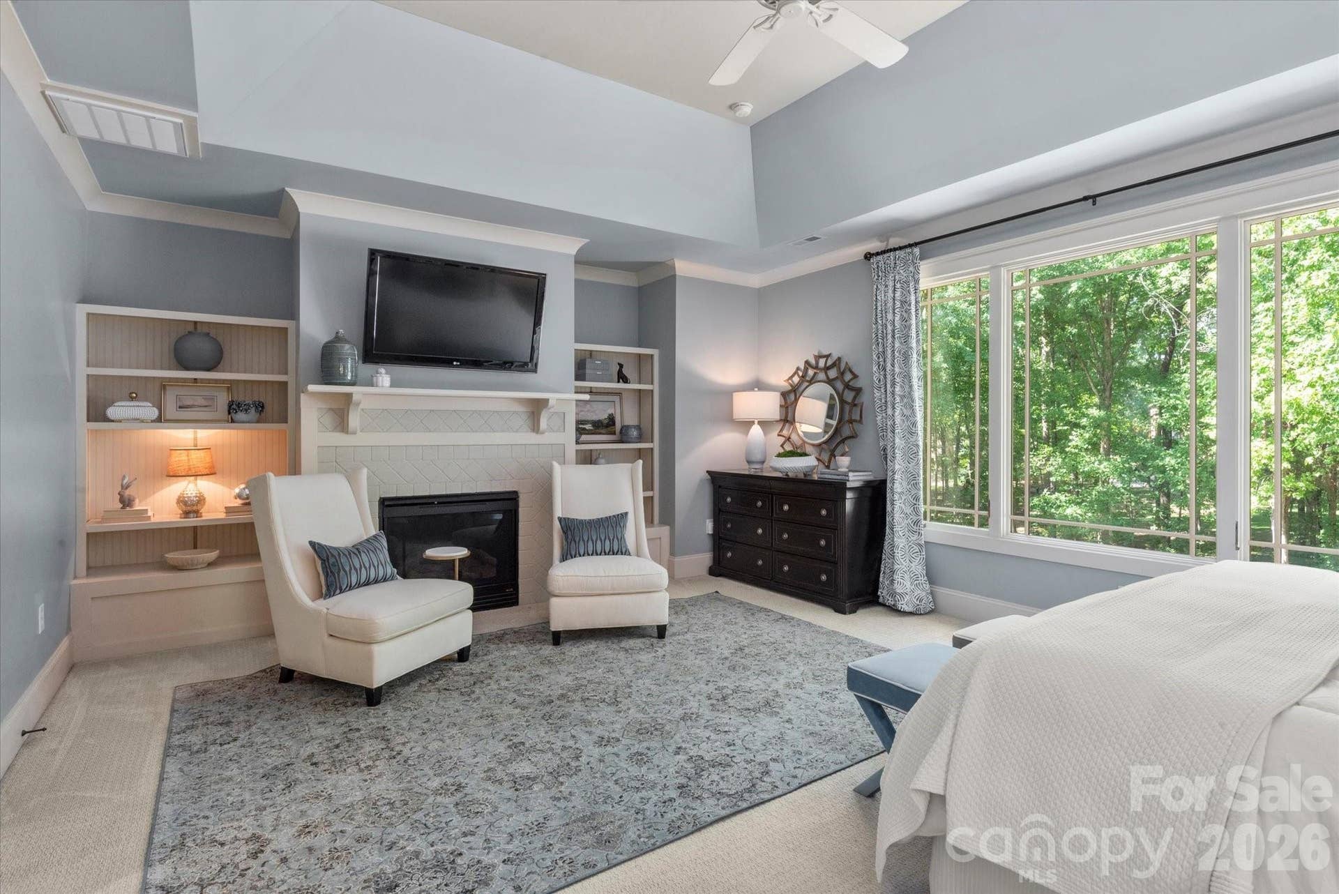 ...and an intimate fireplace surrounded by built-ins.