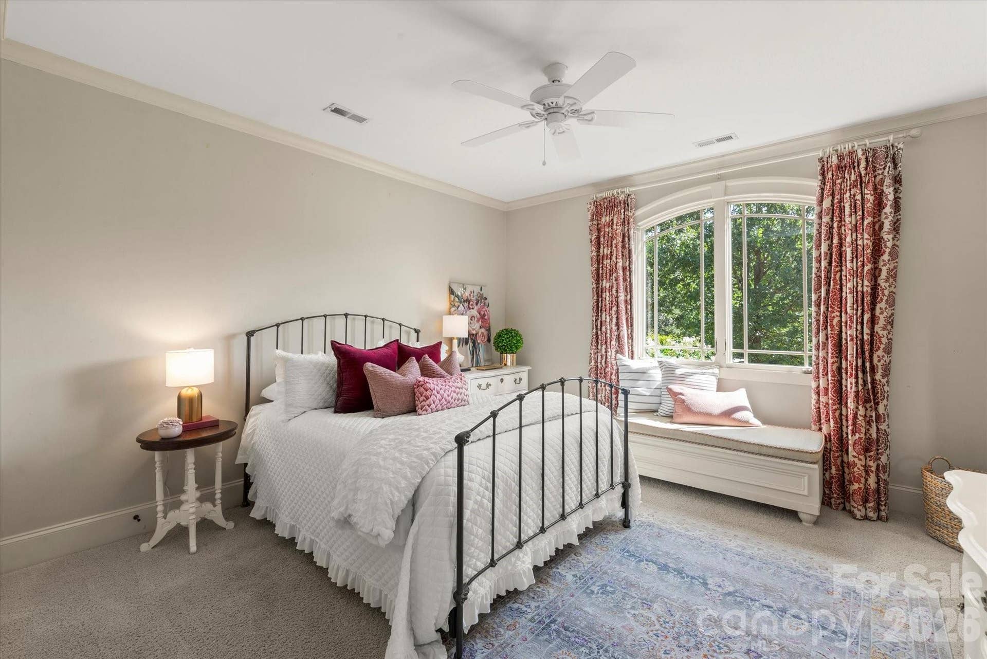 Arched window features and detailed mullins define the european feel.