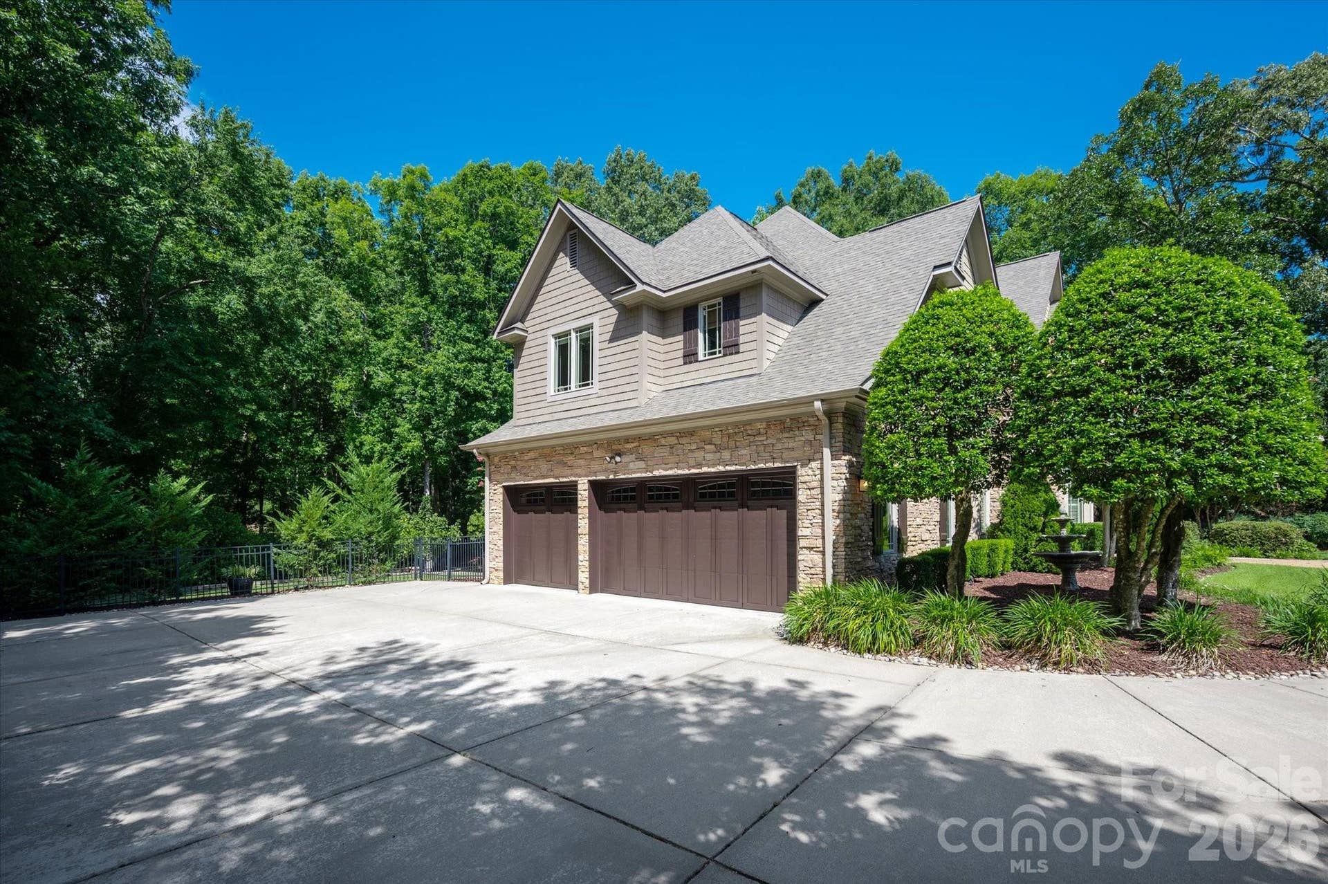 Three car garage offers an abundance of storage versatility for all your personal needs.