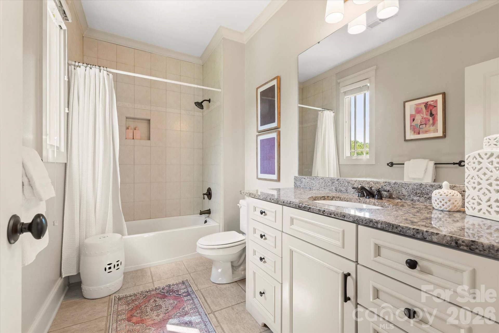 Abundant bathroom space and cabinet storage are featured in all the secondary bathrooms.