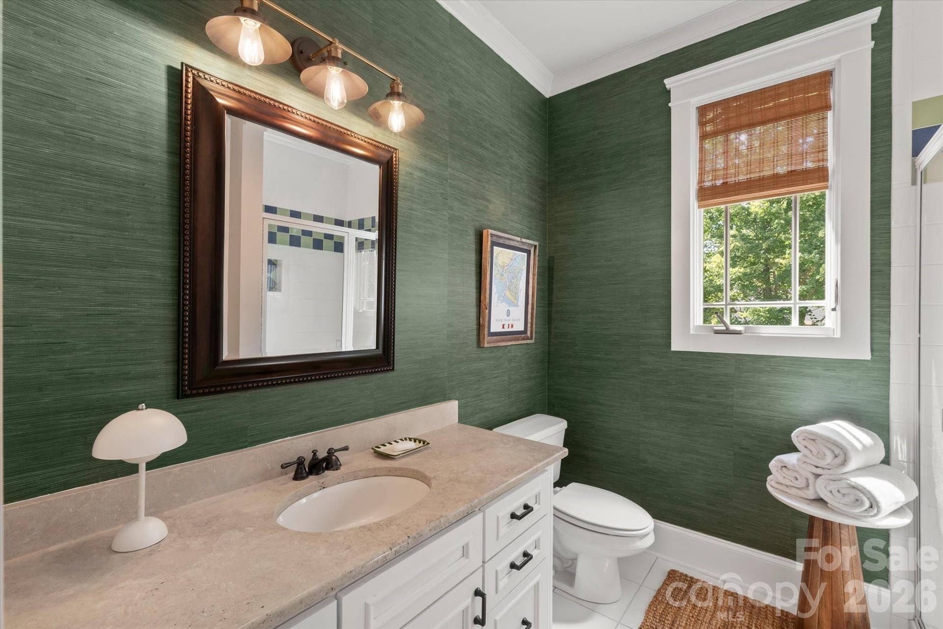 Beautifully maintained full baths featuring timeless tile selections and premium hardware.