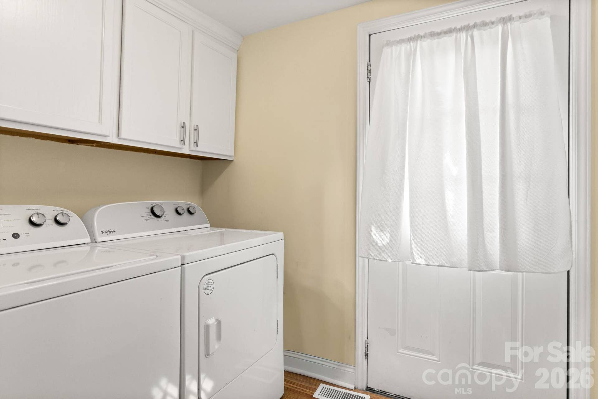 108 Richland Street, Clover, SC 29710 Laundry room with new cabinets, back door to walkout deck