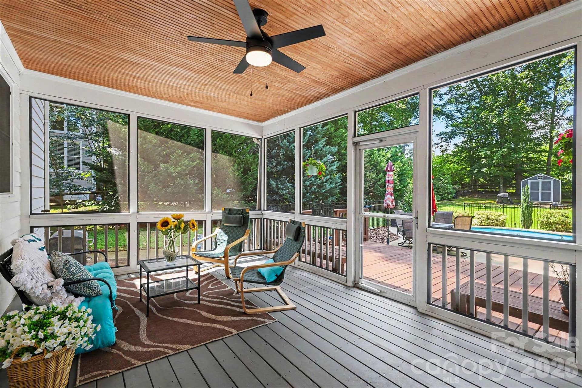 Screened Patio leads to the pool and private backyard