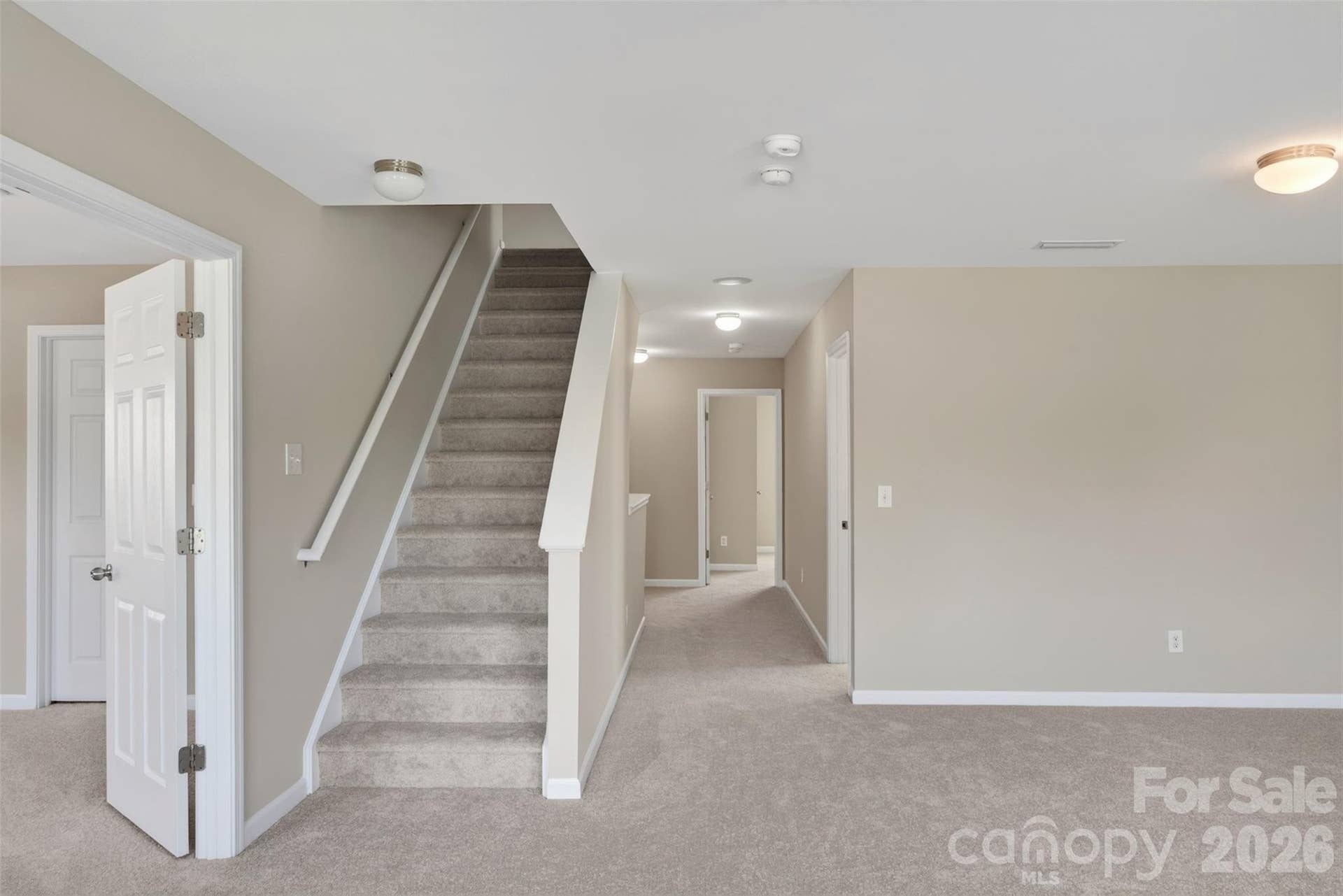 Stair access to the third floor is just off the loft area
