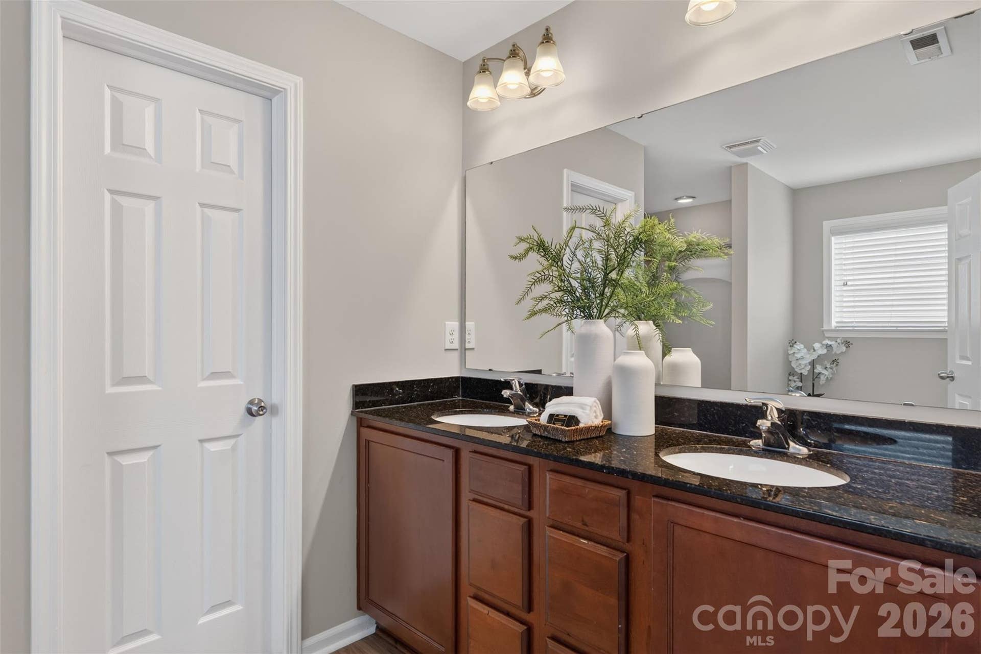 Ensuite with dual vanity, granite counter