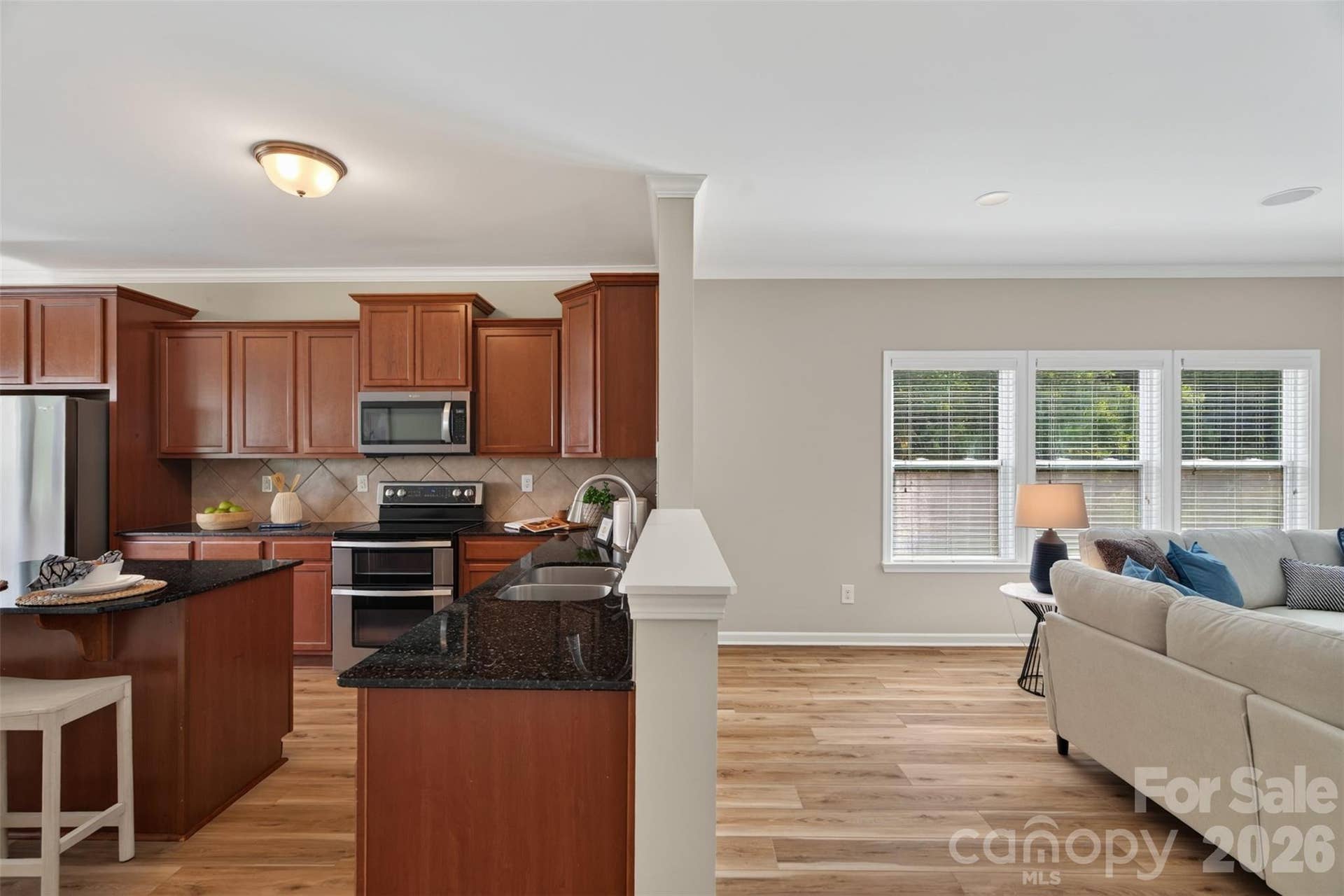 The kitchen is perfectly connected to the living room with tons of counterspace