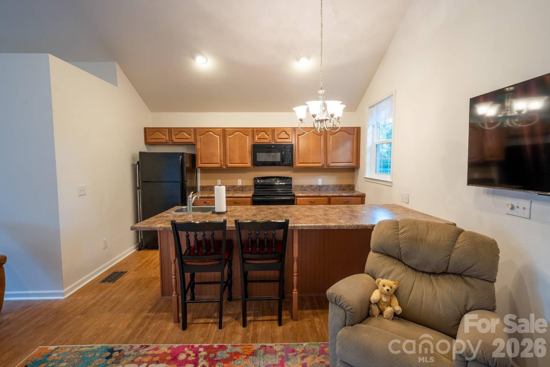 Garage apartment full kitchen w/ GE appliances, granite countertops, and stainless steel sink