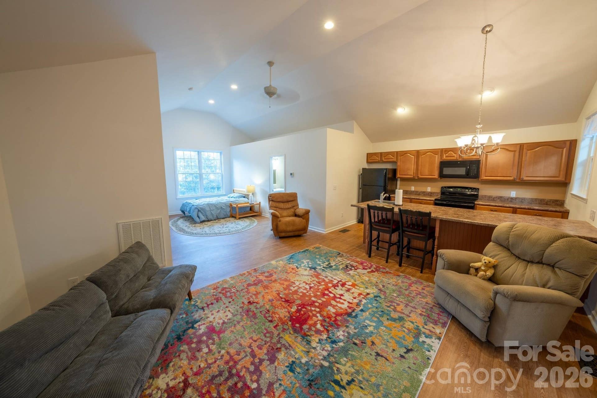 Large bonus living space above the garage w/ full kitchen, full bath, and laundry room