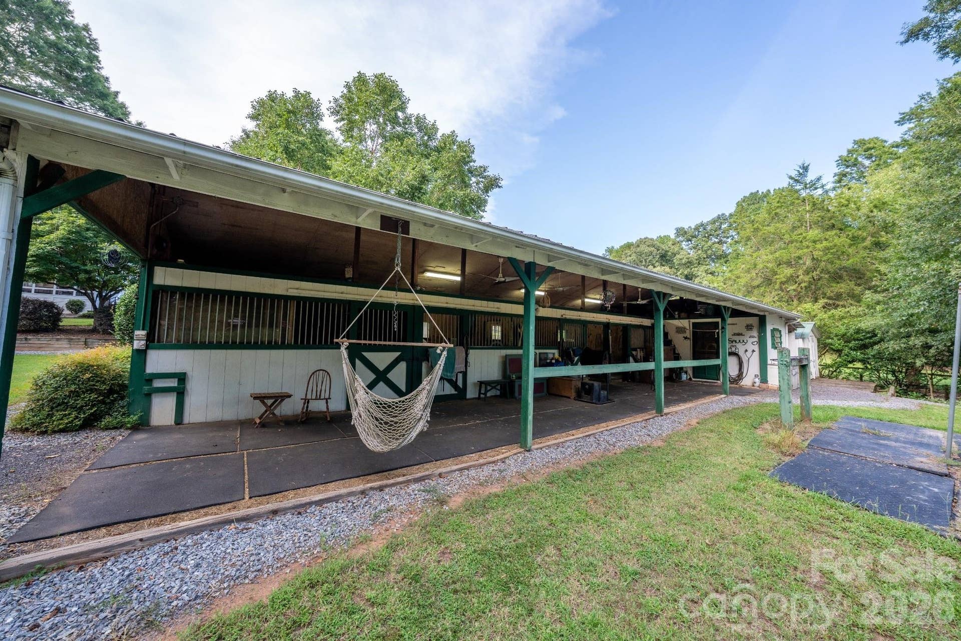 4 stall barn w/ tack room and workshop area