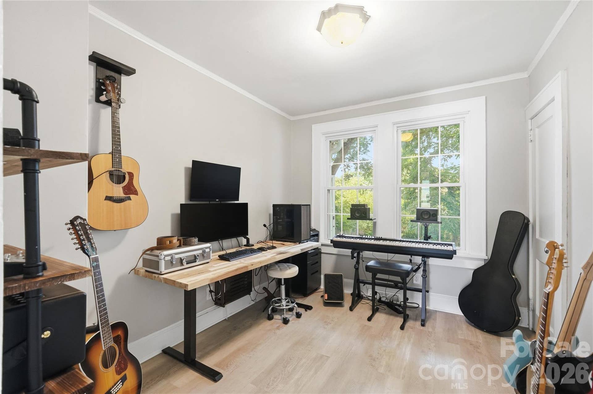 This third bedroom off the main living area offers flexible space to use however fits your needs, whether that's a home office, a creative space, or something else entirely.