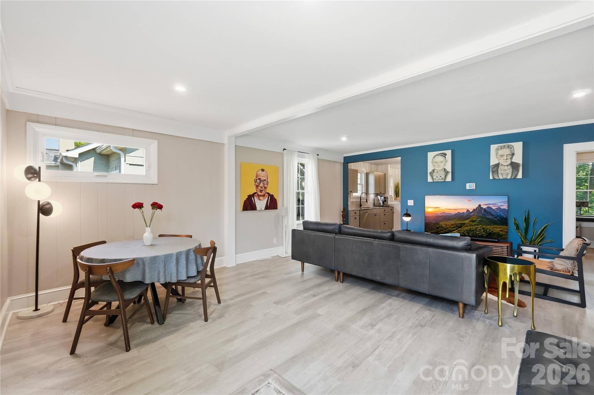 Easy flow, room to room. The living area connects seamlessly to the kitchen and third bedroom.
