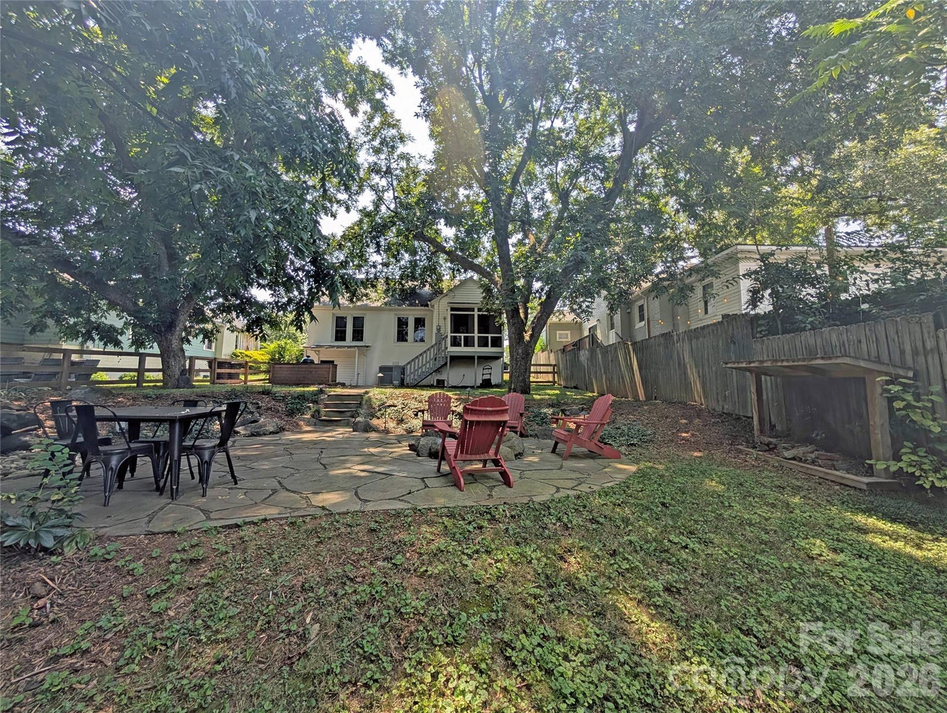 Gather around the fire pit as the sun goes down, with a dedicated spot to store firewood right nearby, everything you need for a night outside.