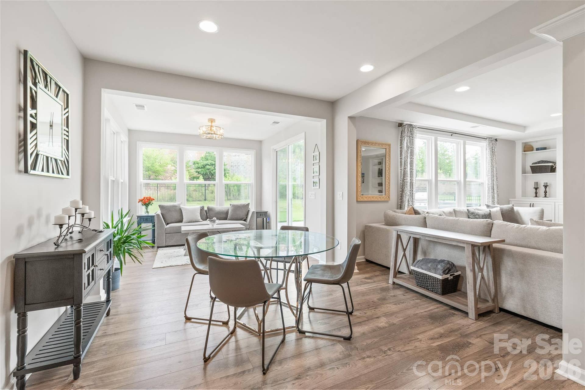 Flanked by natural light, the cheerful breakfast area provides the perfect sunlit nook for casual morning coffee and relaxed everyday meals.