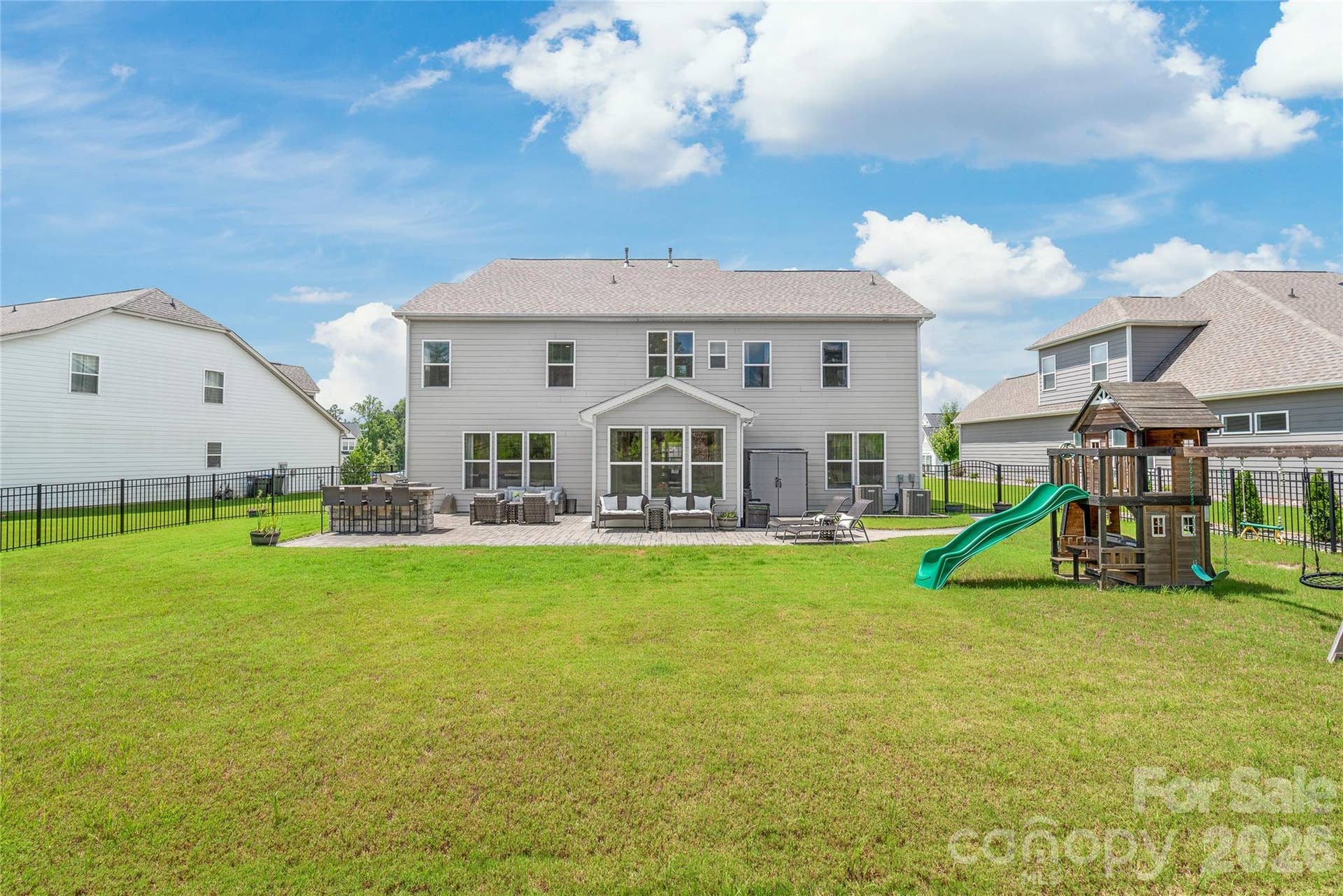 Endless green space and a convenient storage shed to keep your outdoor tools tucked away.