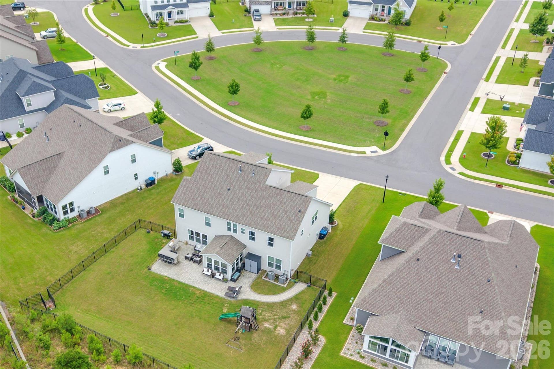 Ideally positioned directly across from a peaceful neighborhood common area, providing added privacy and open green views.