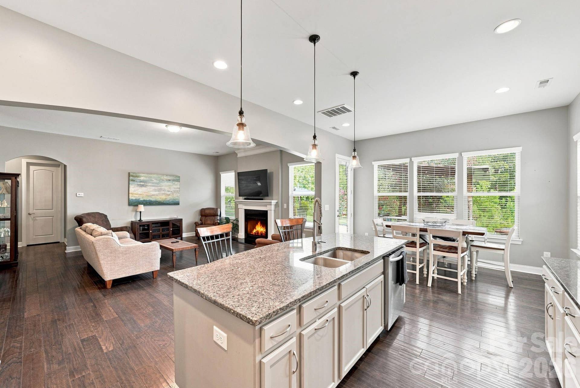 Enjoy being part of everything in the kitchen open to the family room