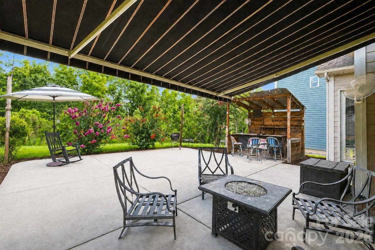 Patio features, extendable awning for shade and sunny afternoons