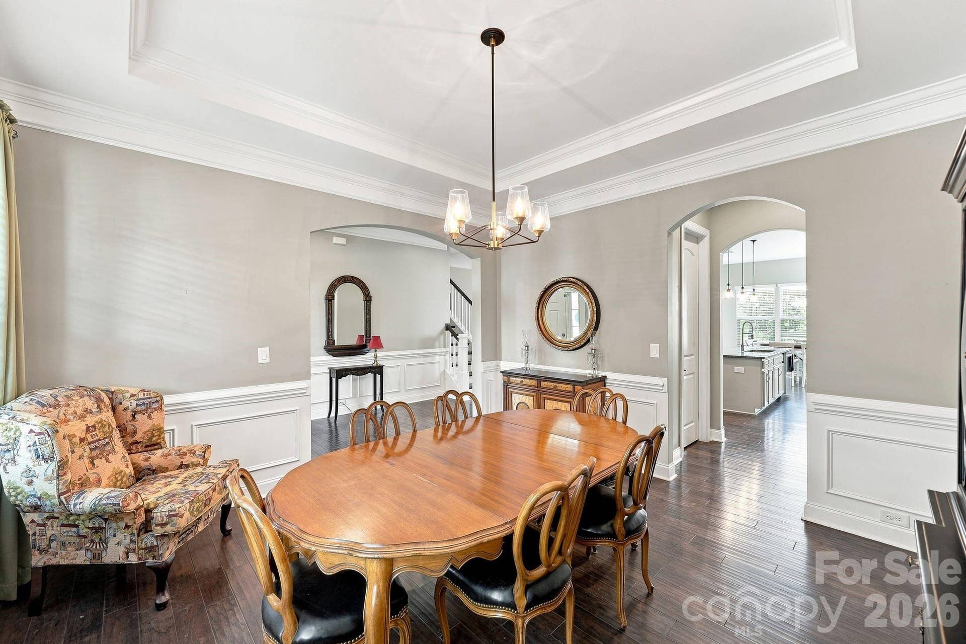 Dining room features, tray ceiling and wainscoting
