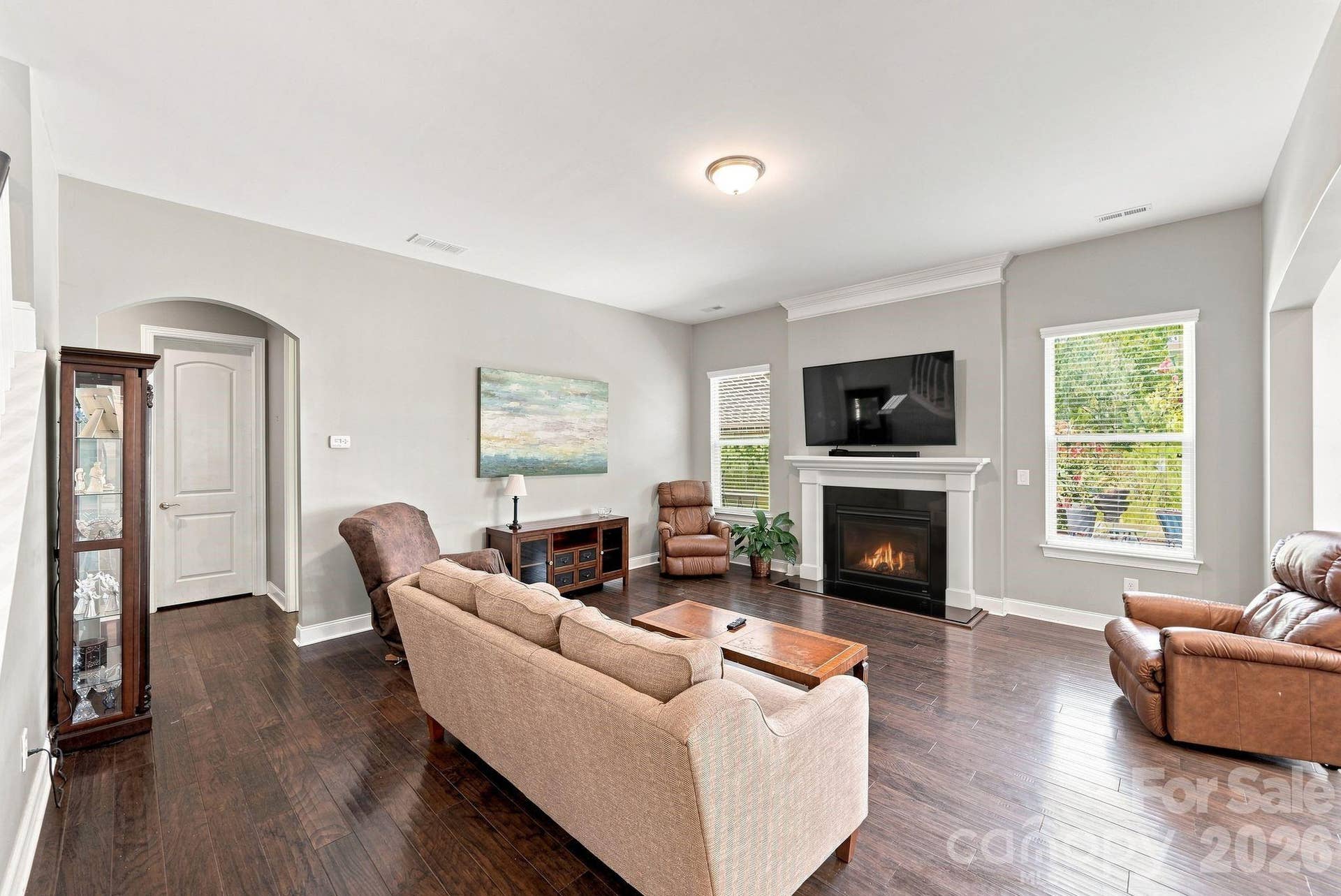 Gather around the gas log fireplace, in the large family room