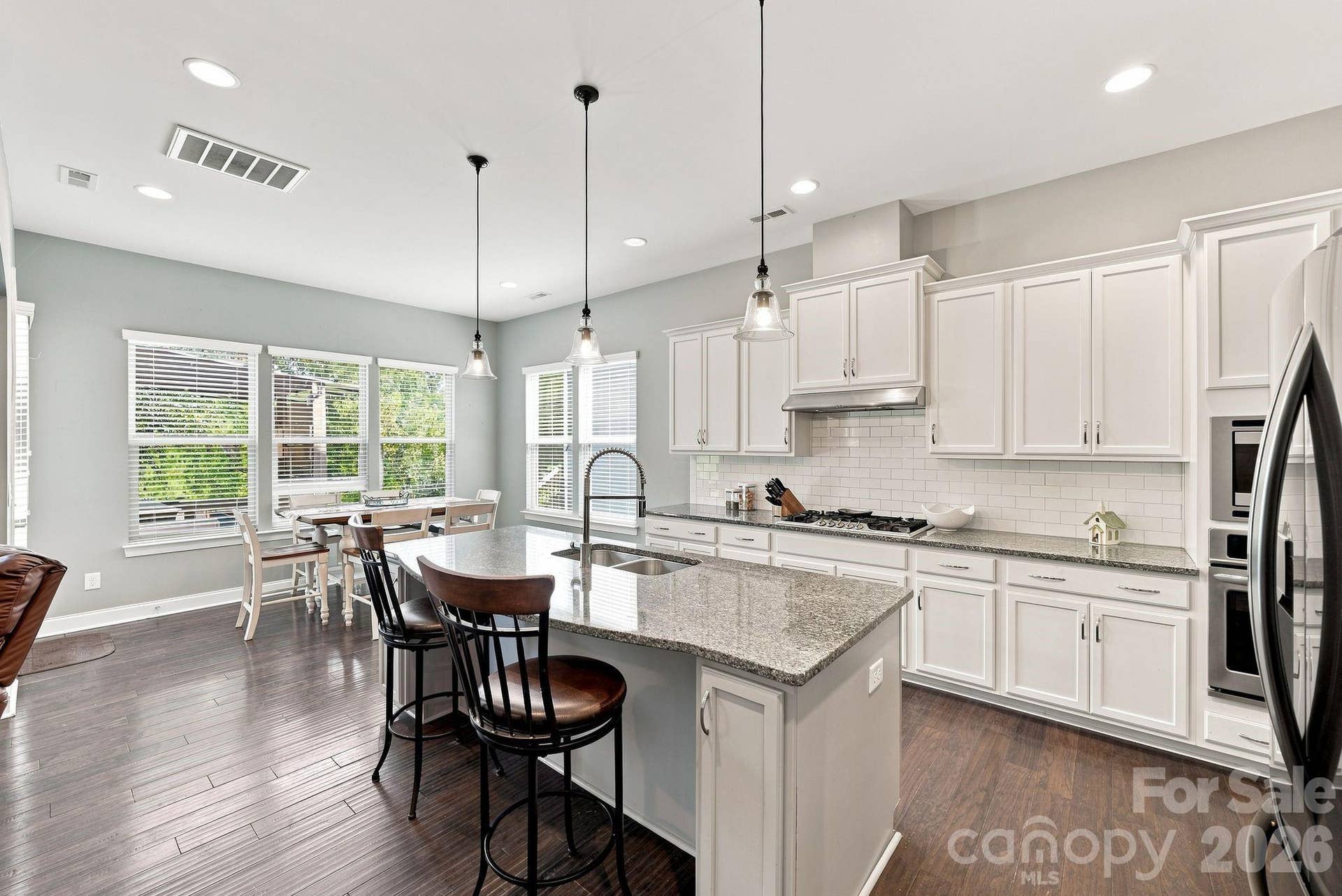 Bright open chefs kitchen with KitchenAidGallery appliances