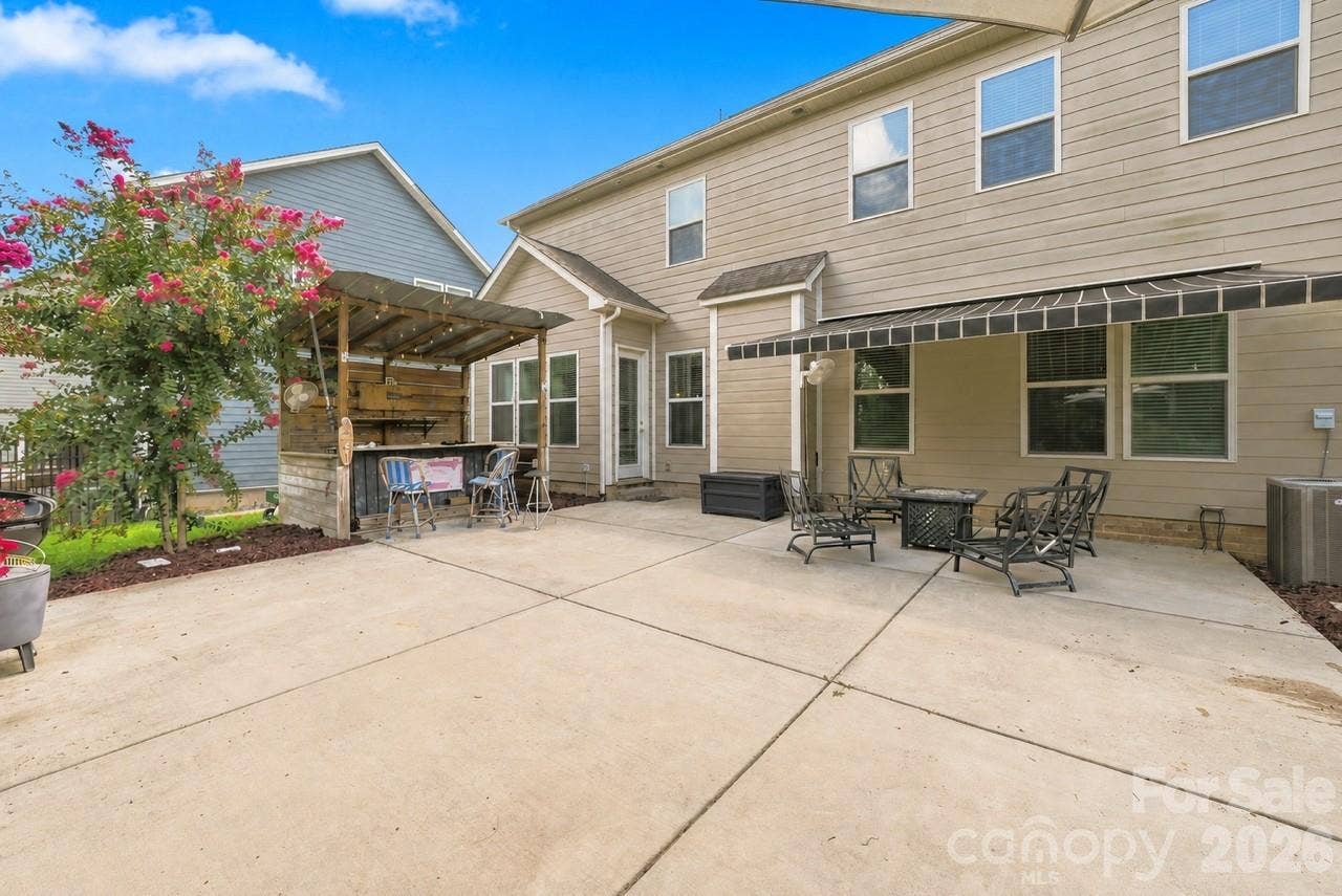 Enjoy entertaining on this oversized patio featuring tiki bar