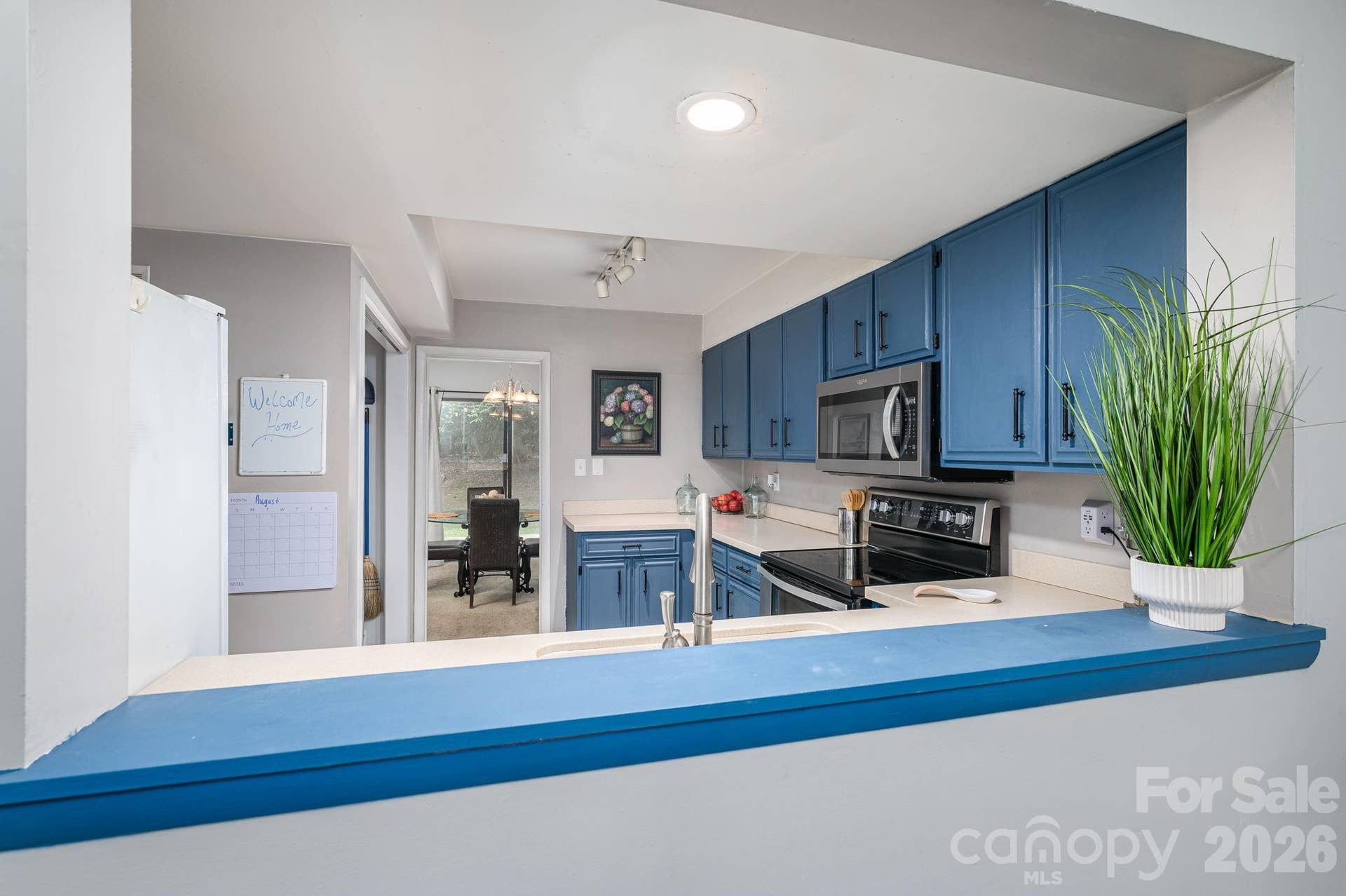 SERVING WINDOW INTO DINING