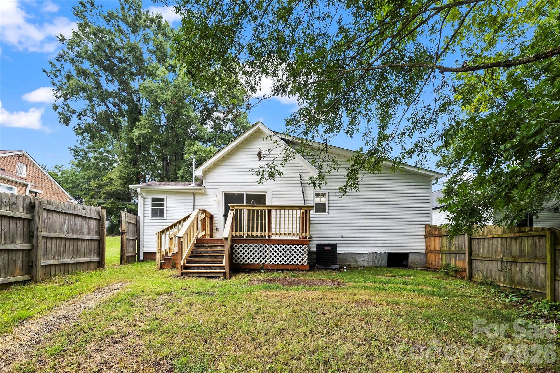 605 Kings Mountain Street, Clover, SC 29710 back of house, deck and fenced backyard