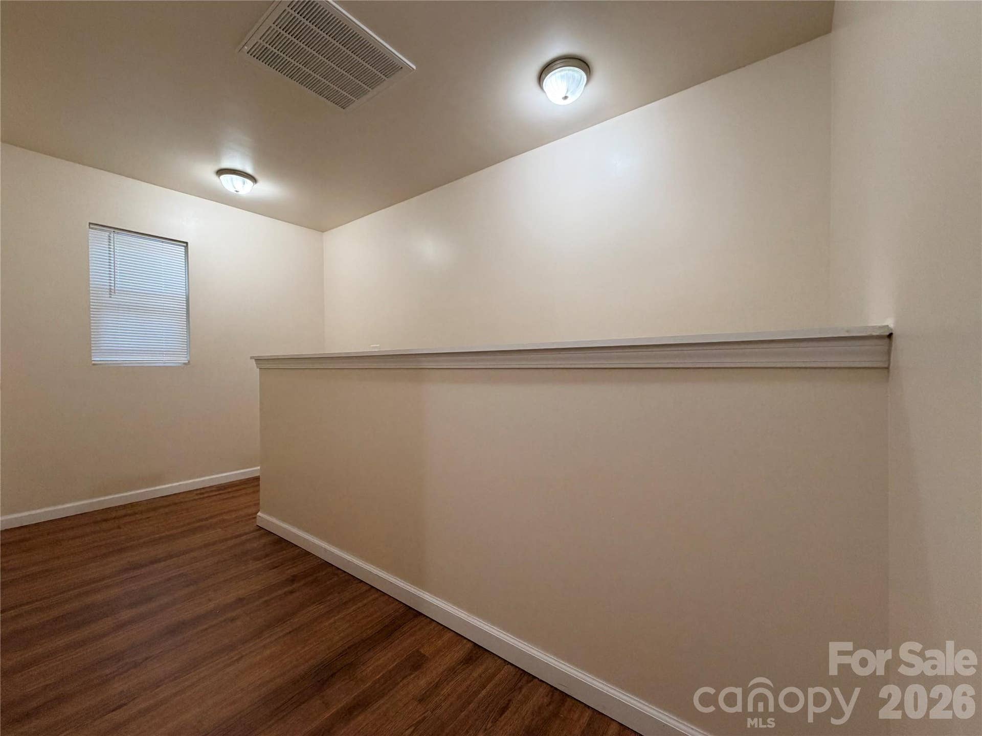 368 E Mills Avenue, Mooresville, NC 28115 Hallway provides access to bedrooms, bathroom, laundry closet and bathroom
