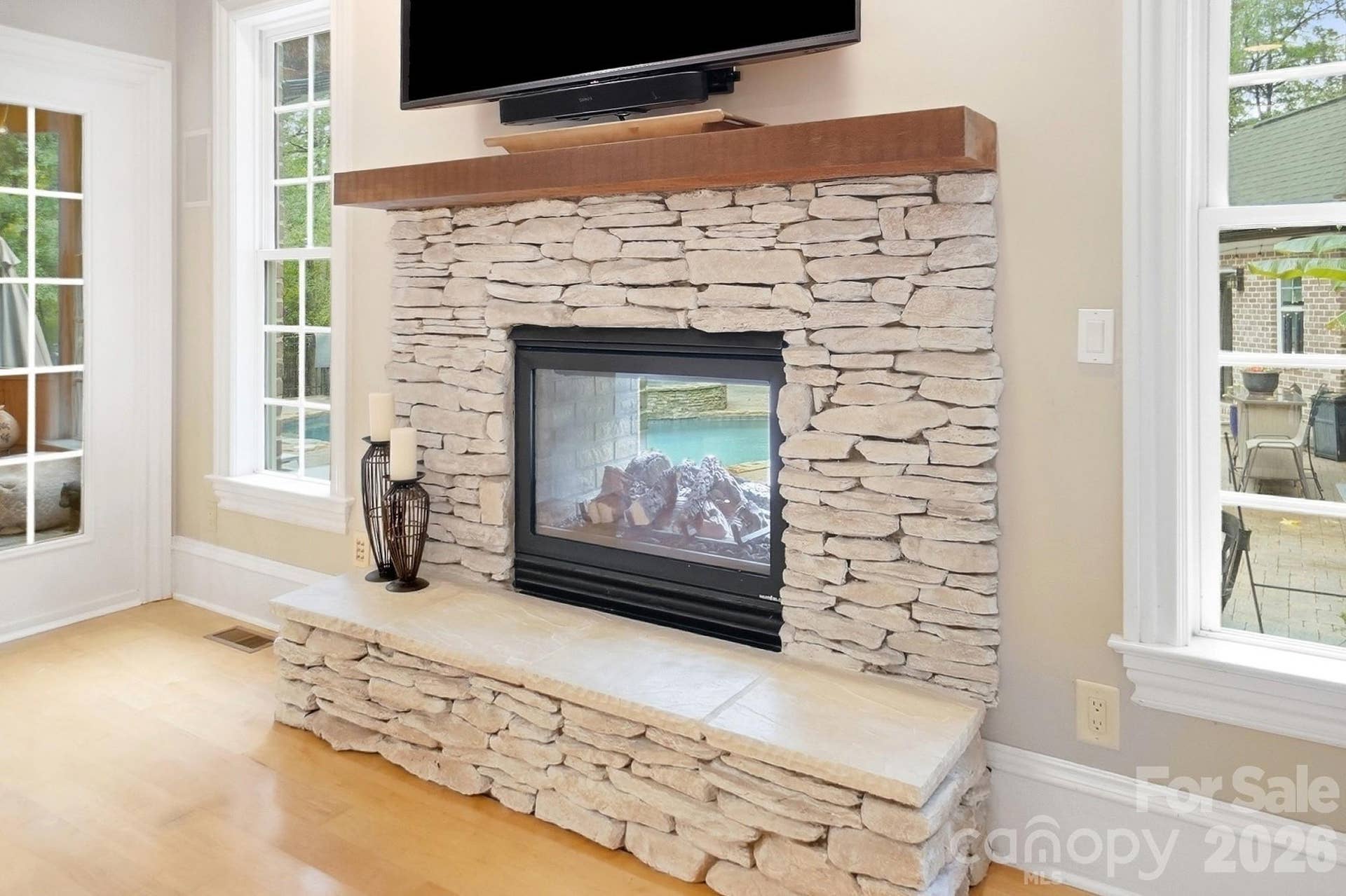 Living Room/Den with 2 way Fireplace