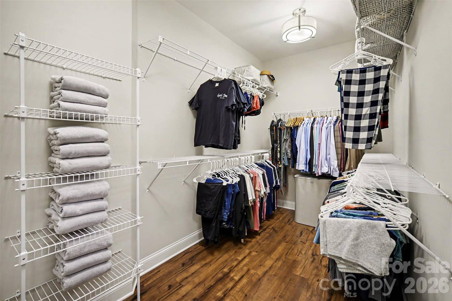 Walk-in primary closet.