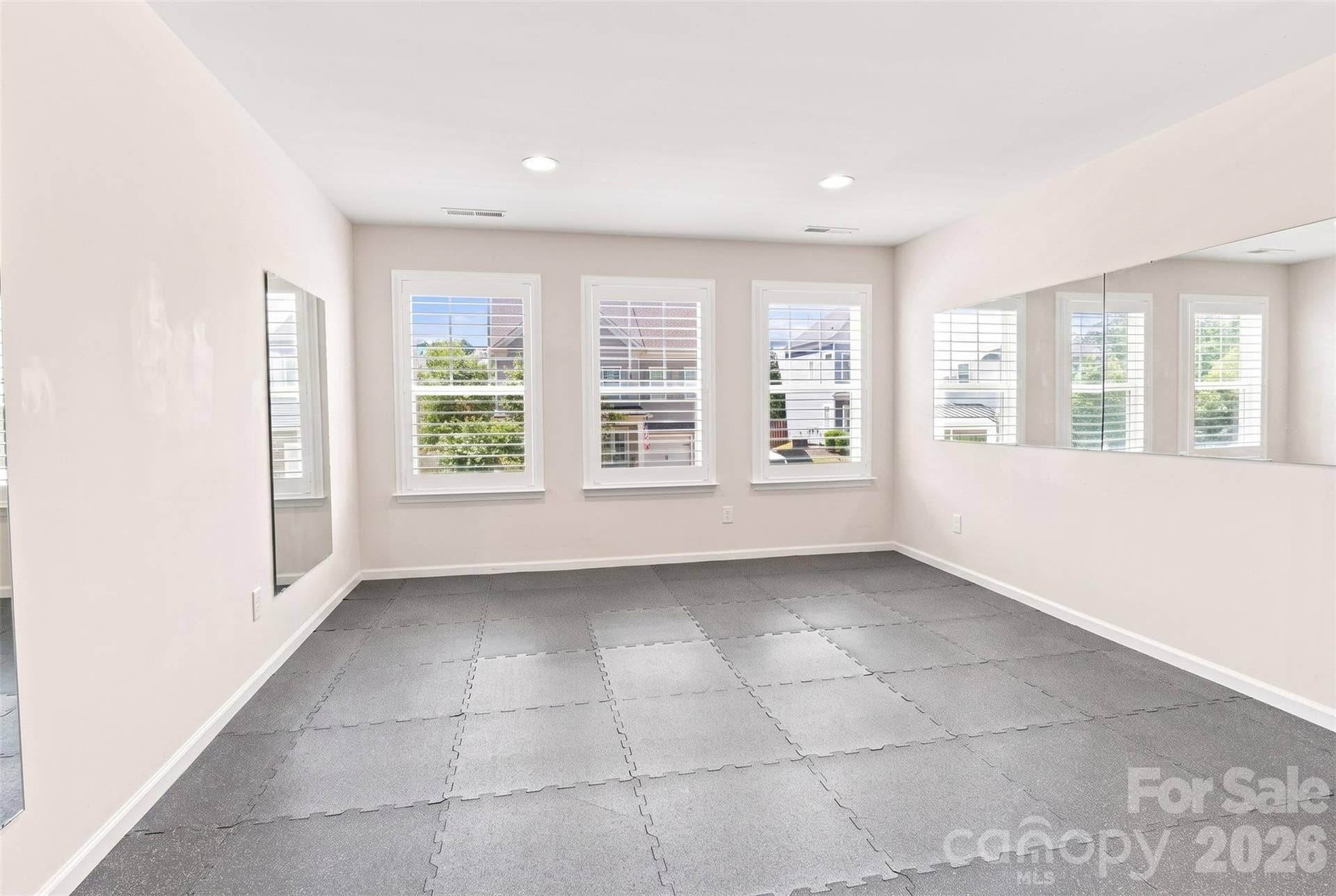 15704 Reynolds Drive, Indian Land, SC 29707 *virtually emptied (gym equipment, mirrors, and flooring do not convey