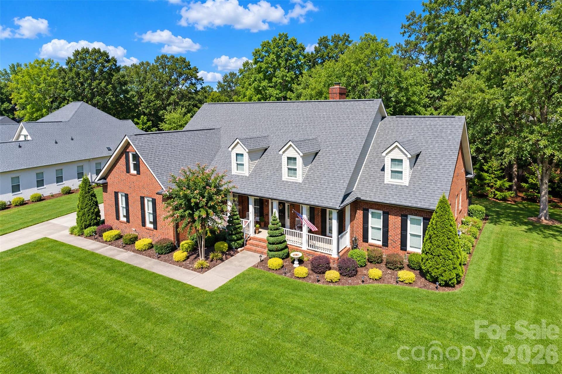 5480 Glen Forest Drive, Charlotte, NC 28226 Profesional Designed Landscaping with Irrigaton System in place (2020). Two gorgeous Spiral Cedar trees, lenten roses, kaleidoscope, midget french plant and a hydrangea await you for Spring blooming. Crawl Space was pre inspected separately. Right side of house has a big area planted with Irises and Day Lillies (Spring),
