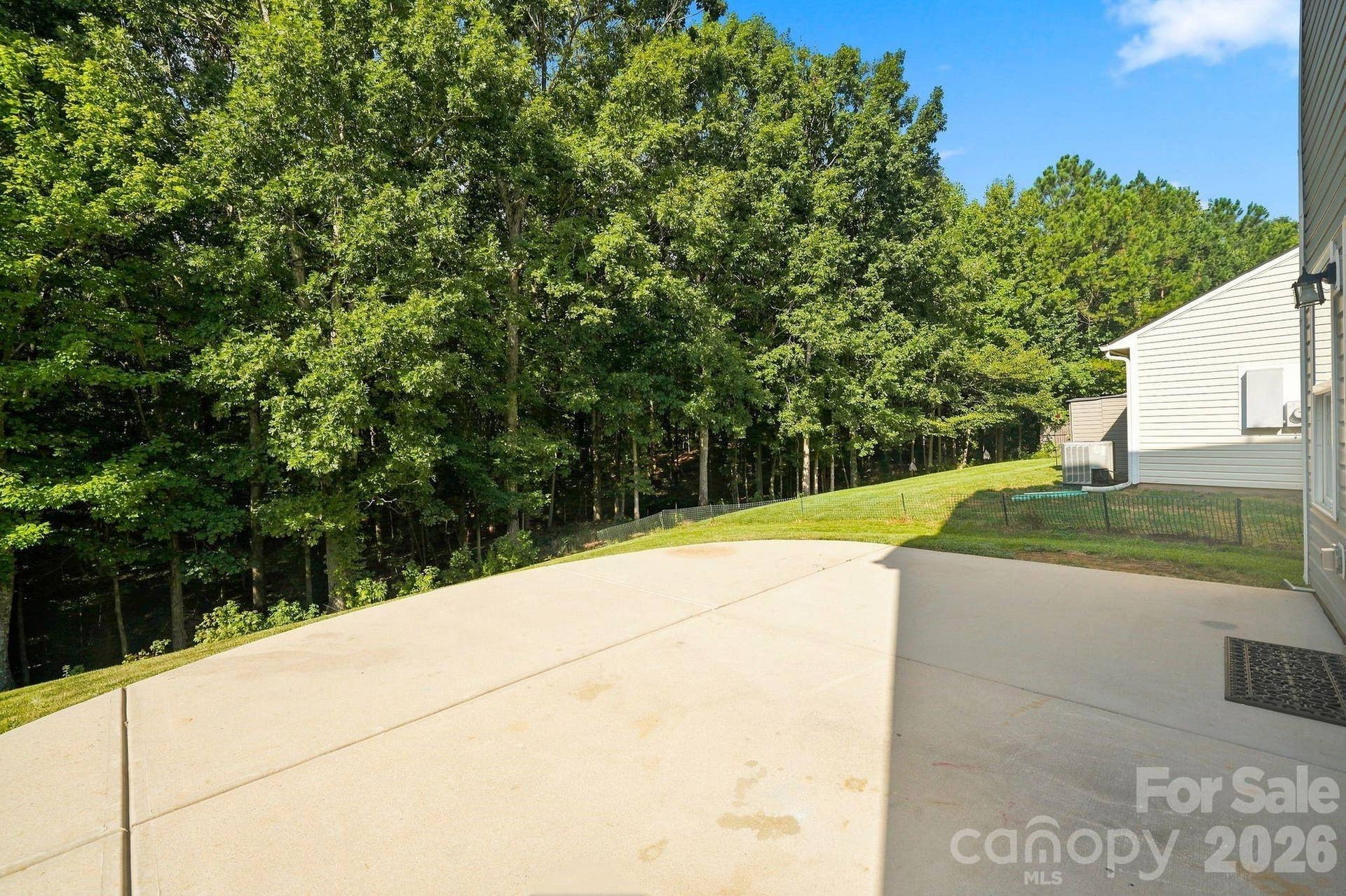 Back yard with no neighbors behind you