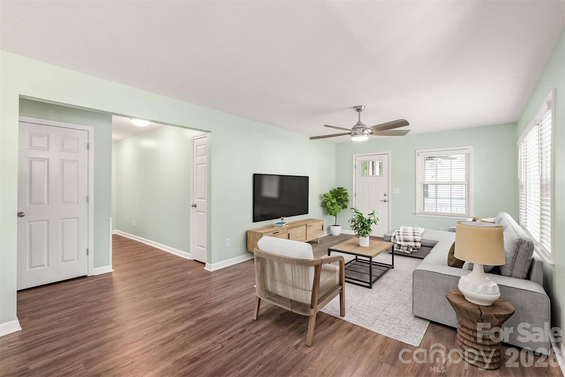 Conveniently situated down a private hallway off the main living area, housing 3 generously sized bedrooms for optimal comfort and quiet. Virtually Staged.