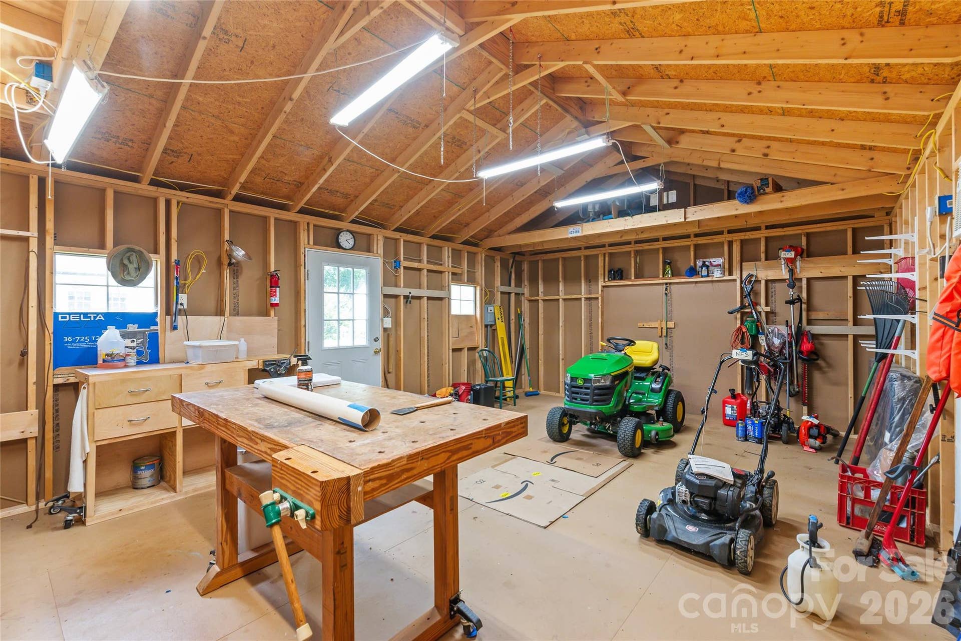 With no HOA rules, a spacious powered workshop, and a flexible floor plan, the options are endless for hobbies, extra storage, home business needs, or outdoor living.