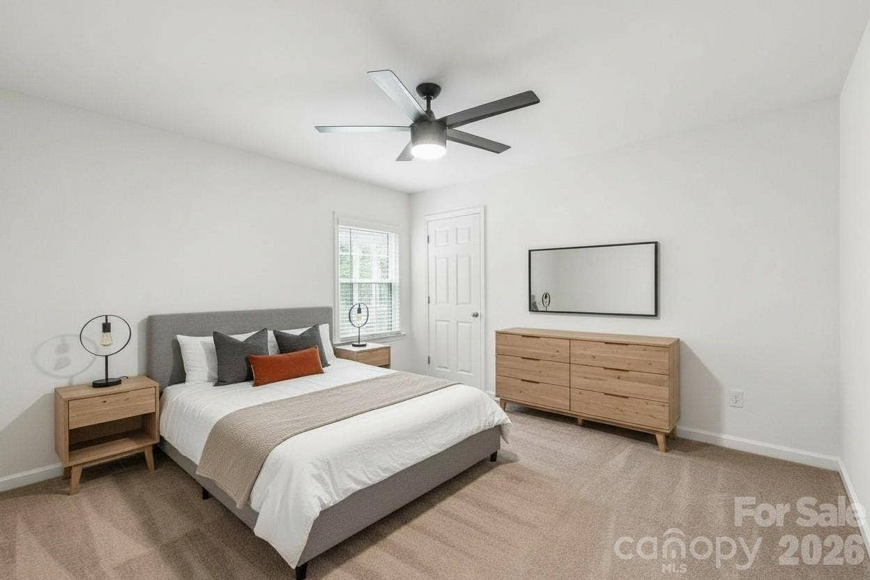 A comfortably sized second bedroom featuring fresh paint and plenty of closet space...ideal for family and guest. Virtually Staged