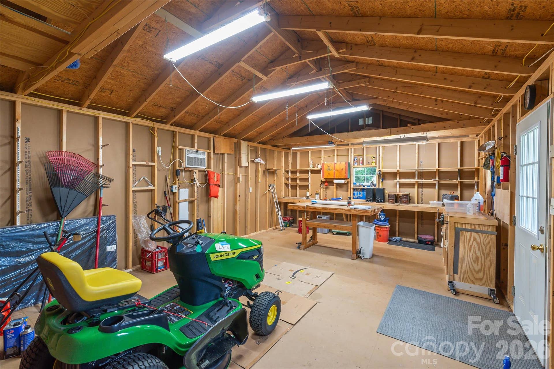This spacious custom workshop comes fully equipped with electrical power...giving you tons of room and electricity for your tools, hobbies, or ultimate workspace setup!