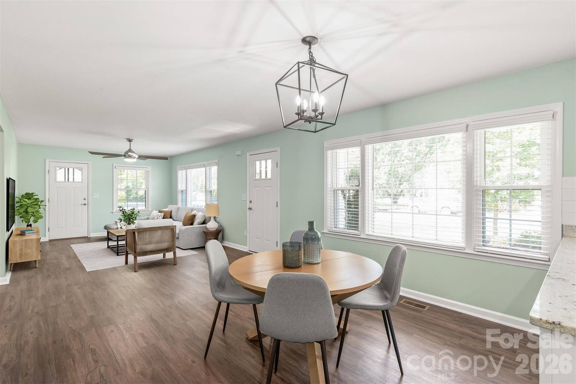 Expansive windows and an open layout invite an abundance of warm, natural sunlight throughout. Virtually Staged.