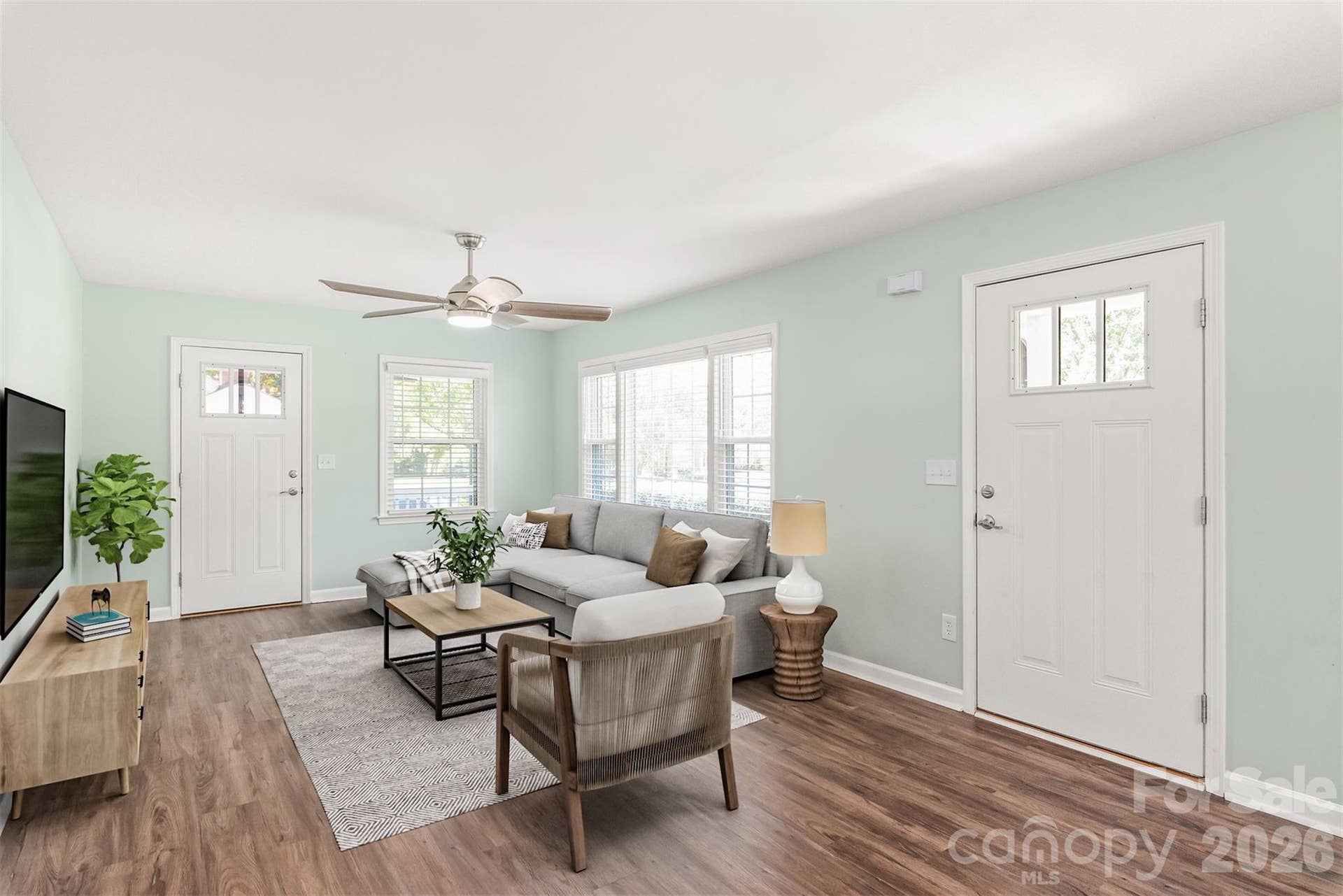 Located directly off the main living room, a charming, covered side porch extends your entertaining space outdoors...offering a quiet retreat for morning coffee or evening relaxation. Virtually Staged.