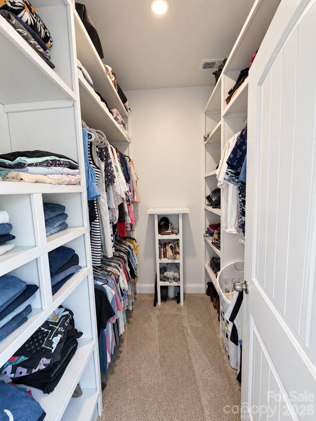 9201 Providence Road S, Waxhaw, NC 28173 Primary walk in closet with new custom shelving