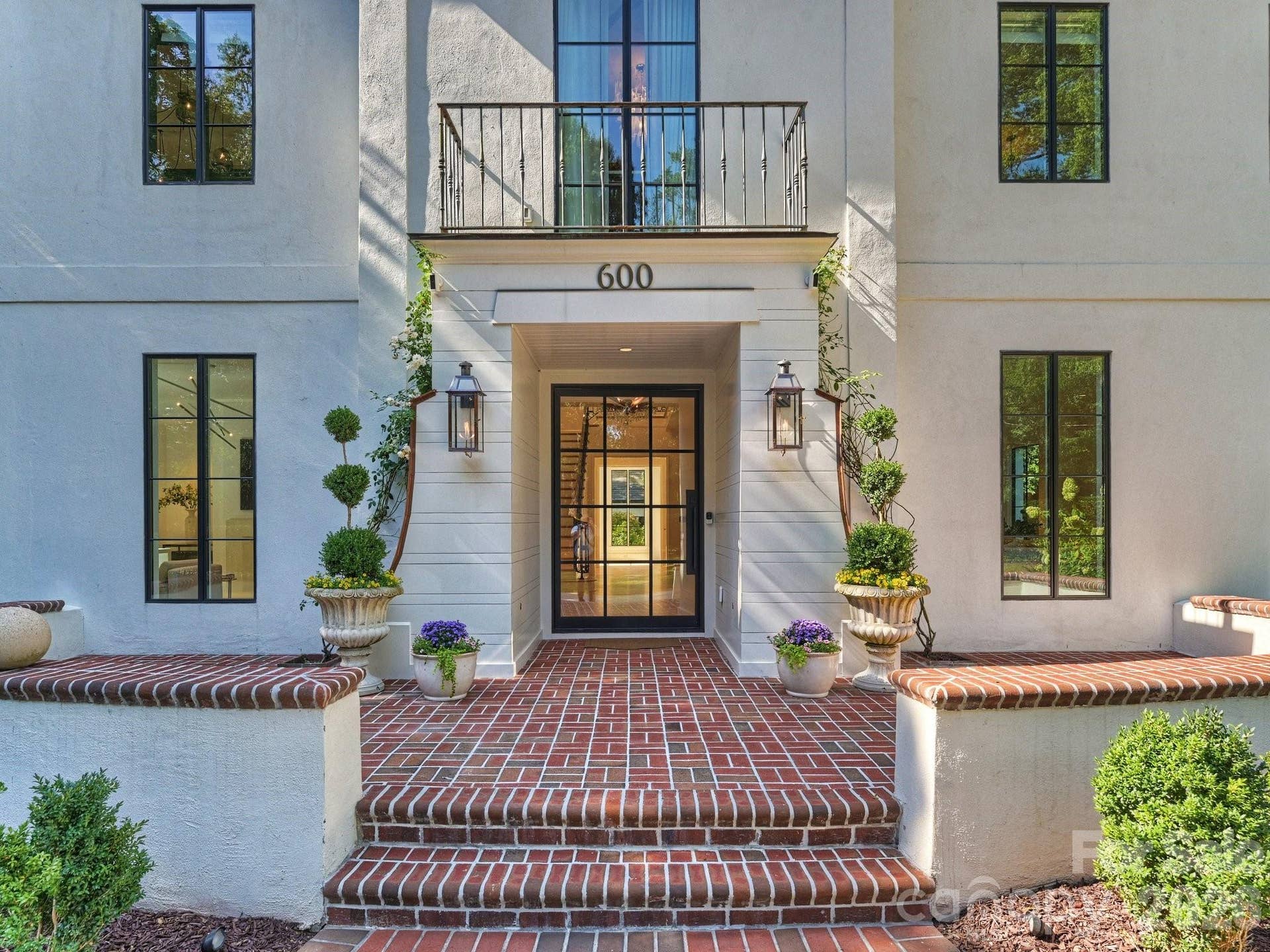 Welcoming entrance with new gas lanterns