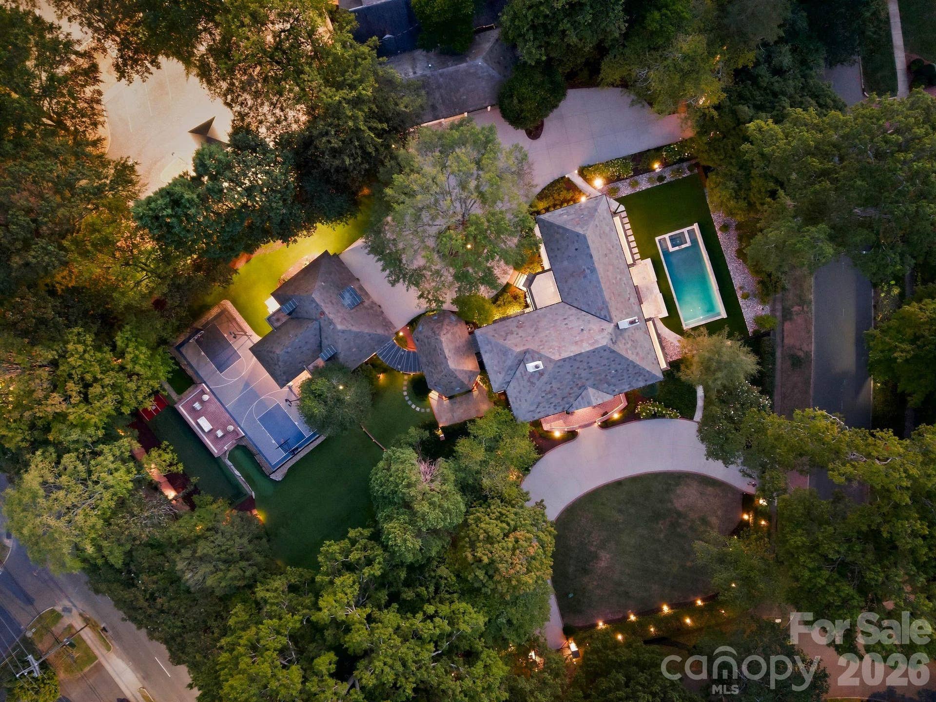 Twilight Aerial of this 1.3 acre estate situated on the corners on Hermitage and Granville Roads