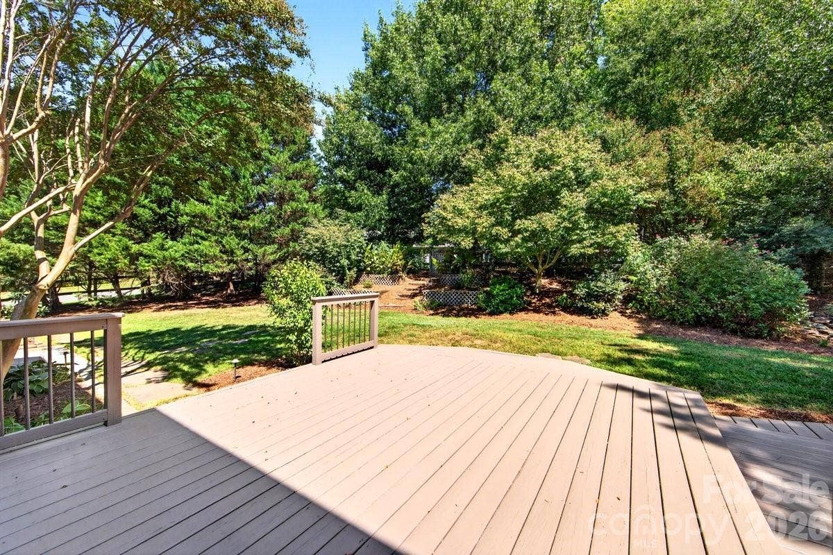 2901 Firewood Drive, Matthews, NC 28105 This .43 acre lot backs to trees and is very private.