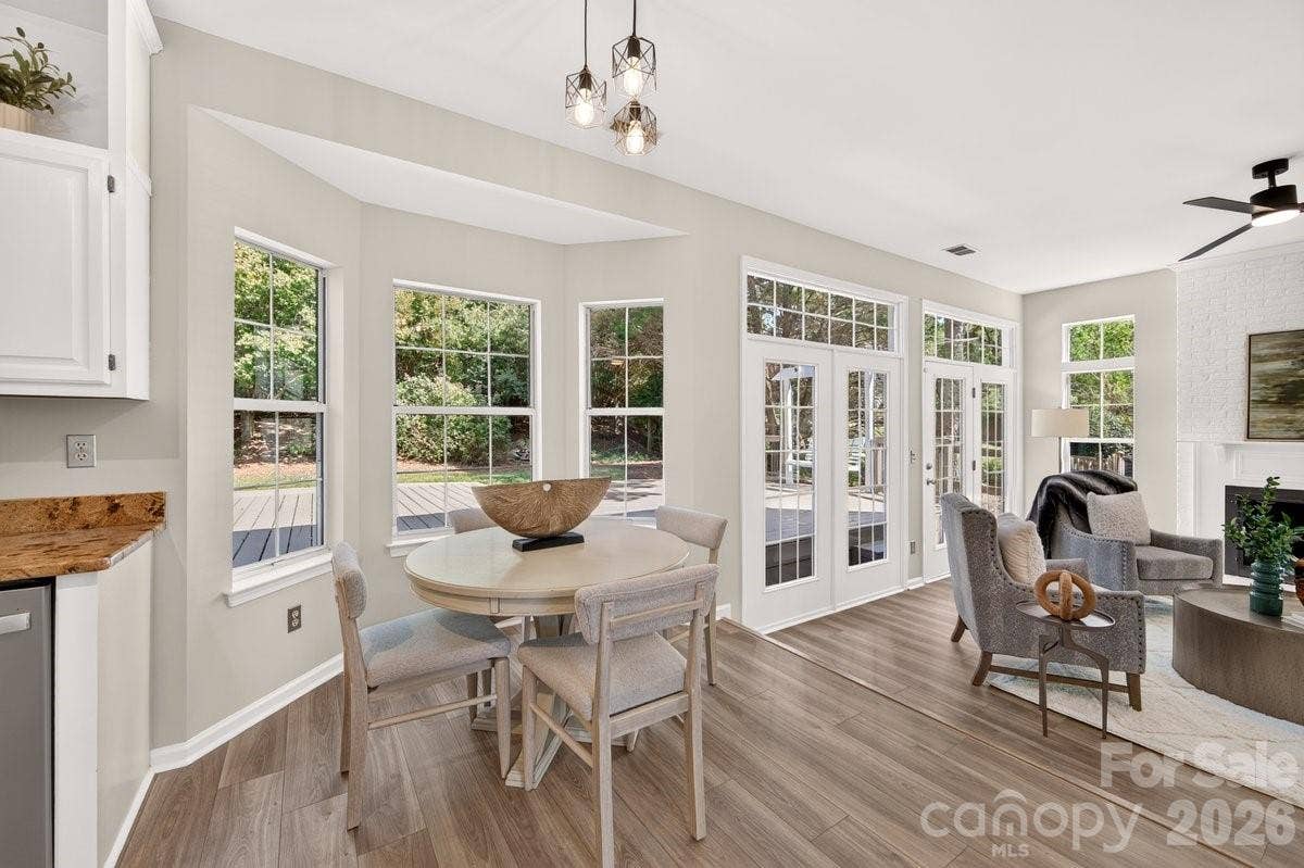 2901 Firewood Drive, Matthews, NC 28105 The charming breakfast nook with bay window overlooks the deck and fenced yard.