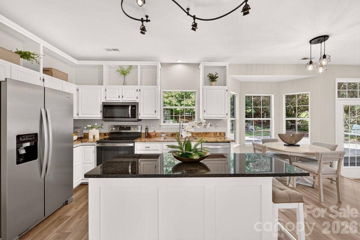 2901 Firewood Drive, Matthews, NC 28105 Granite countertops and stainless steel appliances.