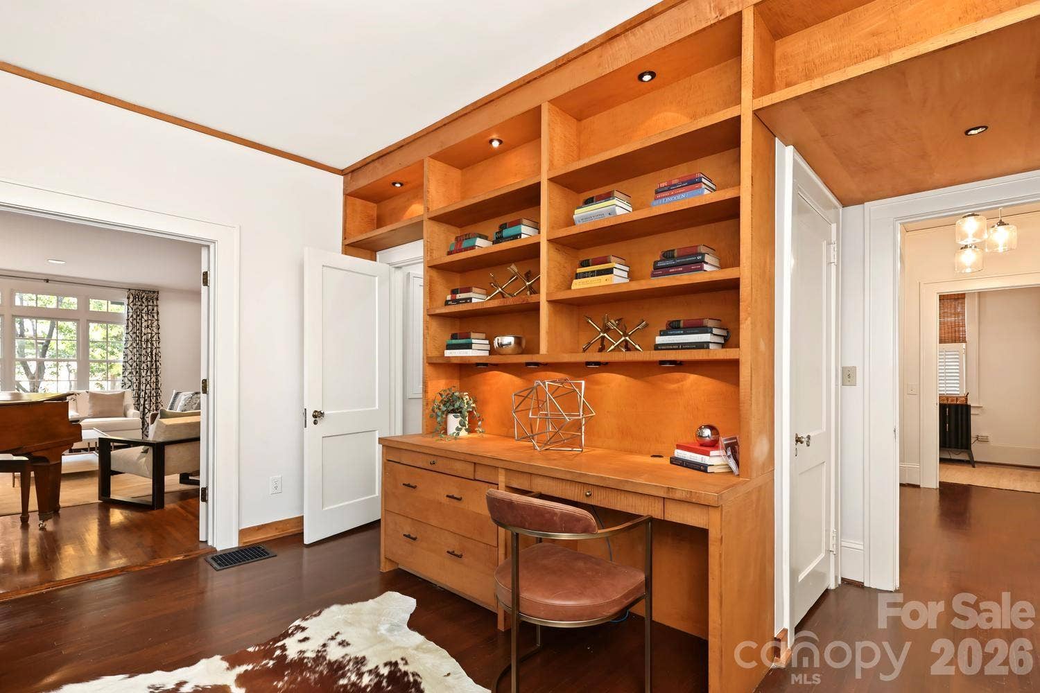 Flex space with custom built ins; great for home office or play room