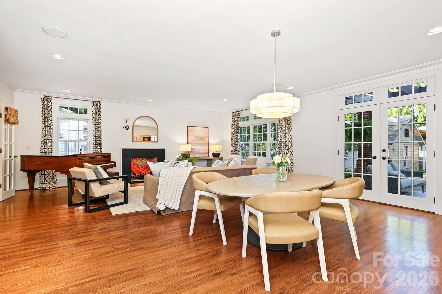 Generous family room gas fireplace and additional dining space